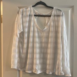 White long sleeve athletic shirt with open back